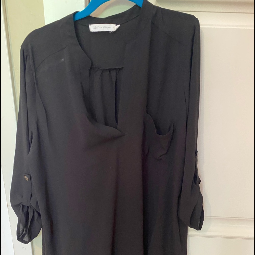 Stylish Black long flowy blouse .